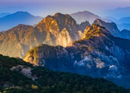I've been to Huangshan Mountain and Taishan Mountain. What other mountains can I visit in China?